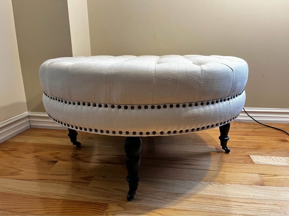 Ashden Round Cocktail Ottoman with Wheels