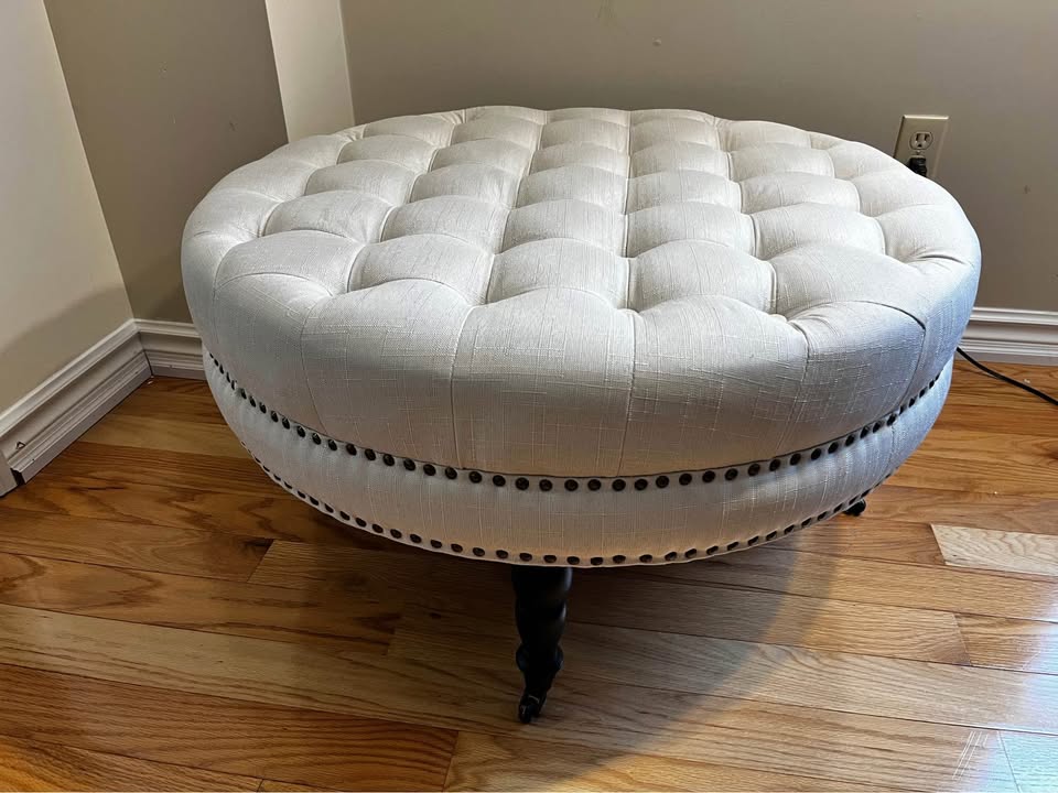 Ashden Round Cocktail Ottoman with Wheels