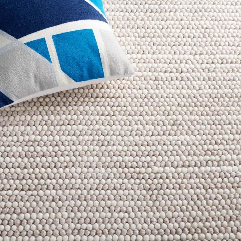 Handwoven Ivory/Beige Area Rug – Modern & Textured